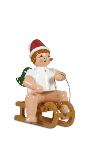 Ellmann - Weihnachtsengel auf Schlitten sitzend mit Mütze