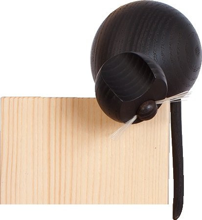 Frieder Weisflog - Katze schwarz - an Ecke sitzend